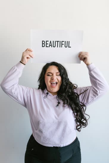 woman holding beautiful sign