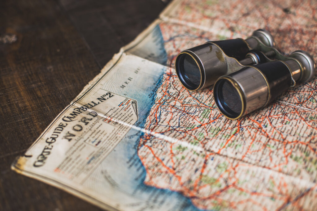 A map and binoculars.