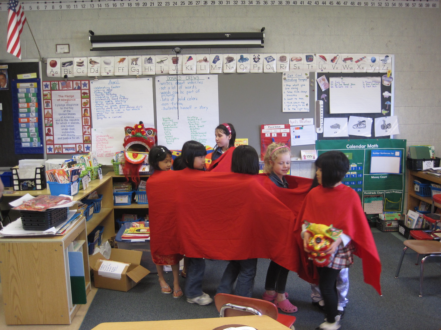 Children form a human Chinese dragon