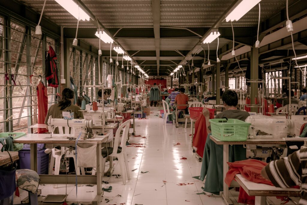 workers in a clothing factory making clothes