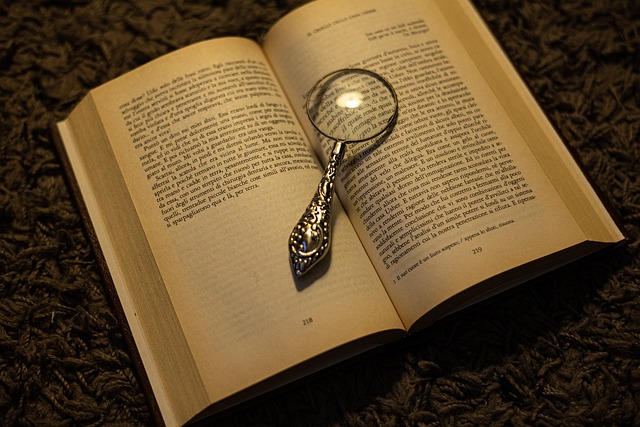 open book with magnifying glass