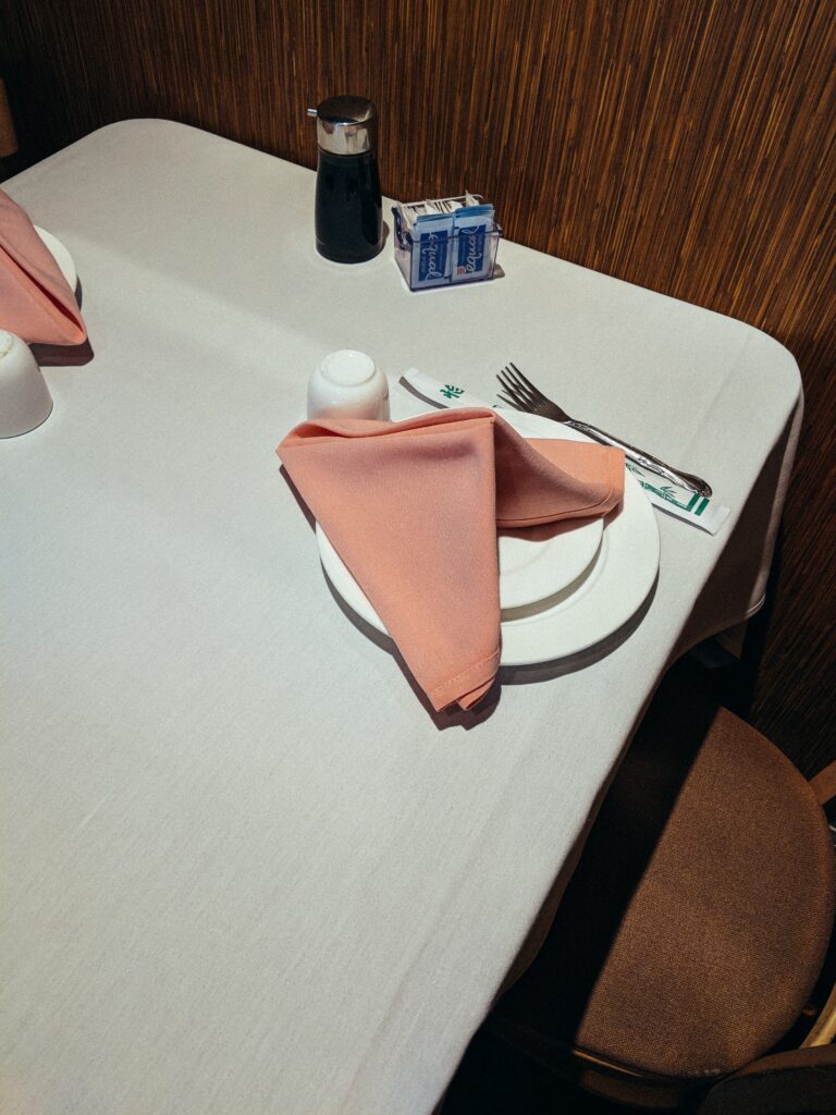 Healthy eating made simple by finalizing your meal. Plate with a napkin over it.