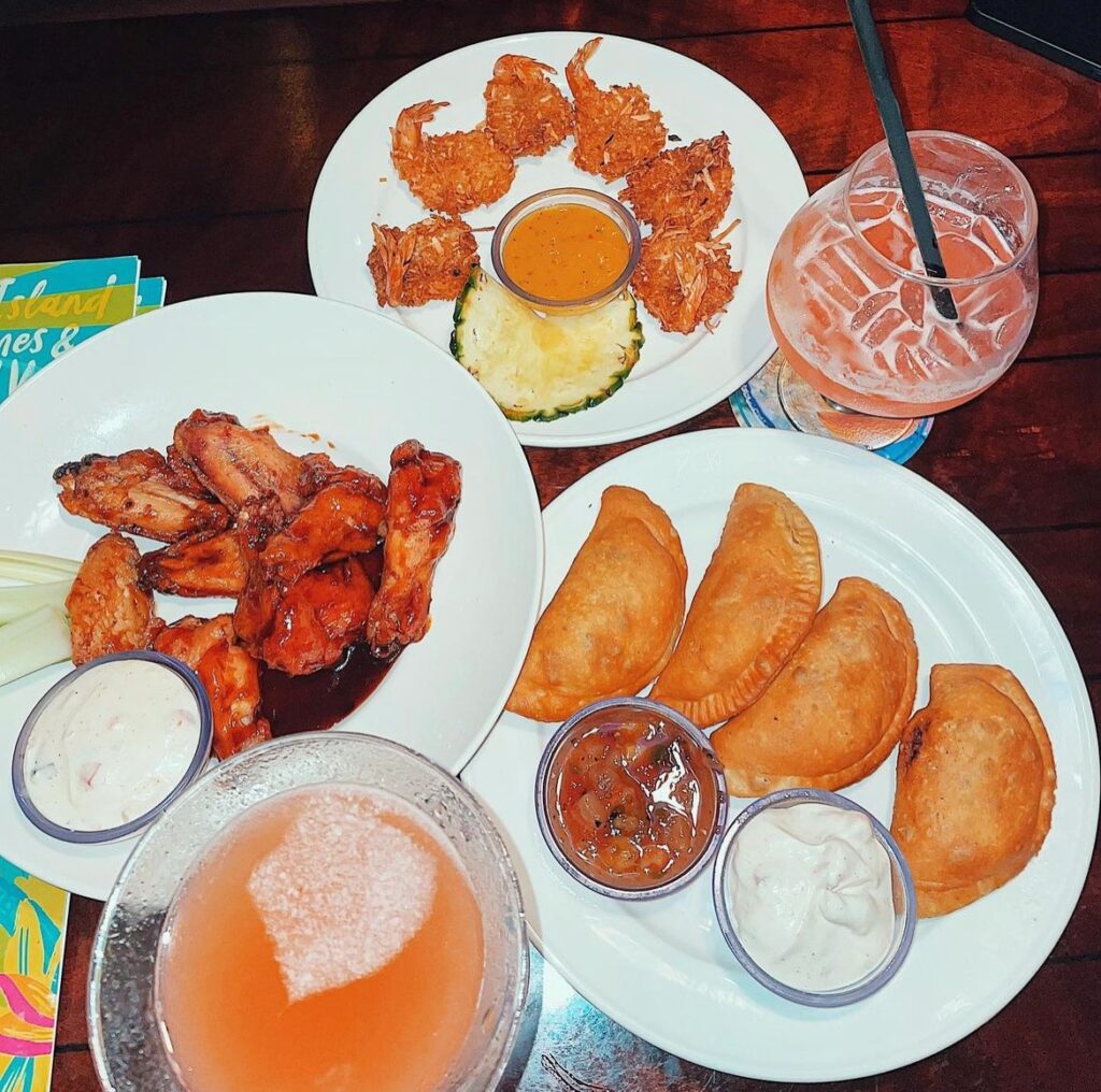 Coconut shrimp, chicken wings, and beef empanadas from Bahama Breeze Island Grille. Good restaurants in Paramus, NJ