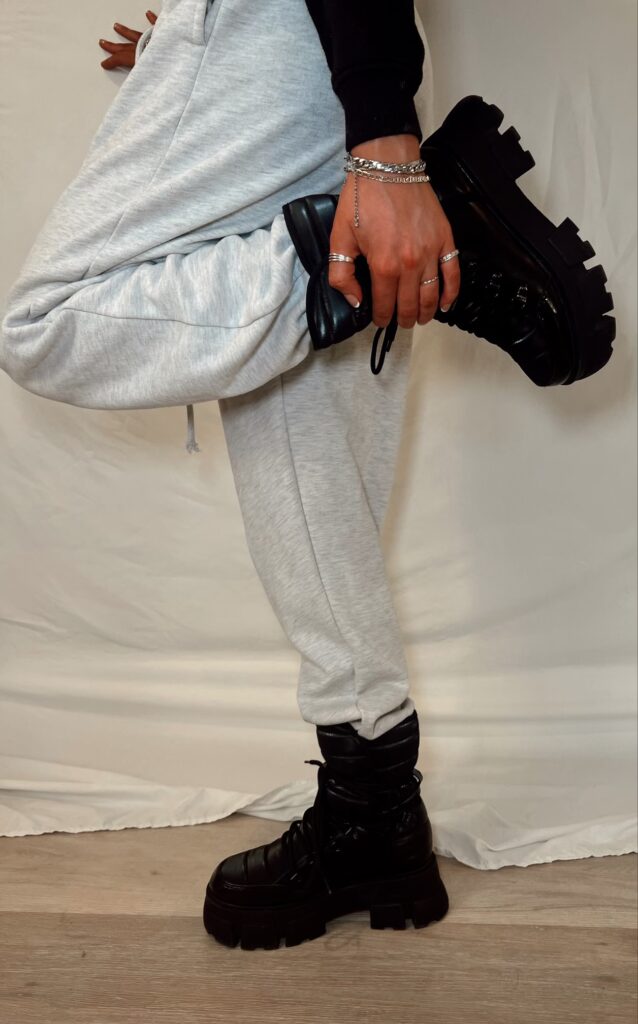 black platform boots paired with grey joggers