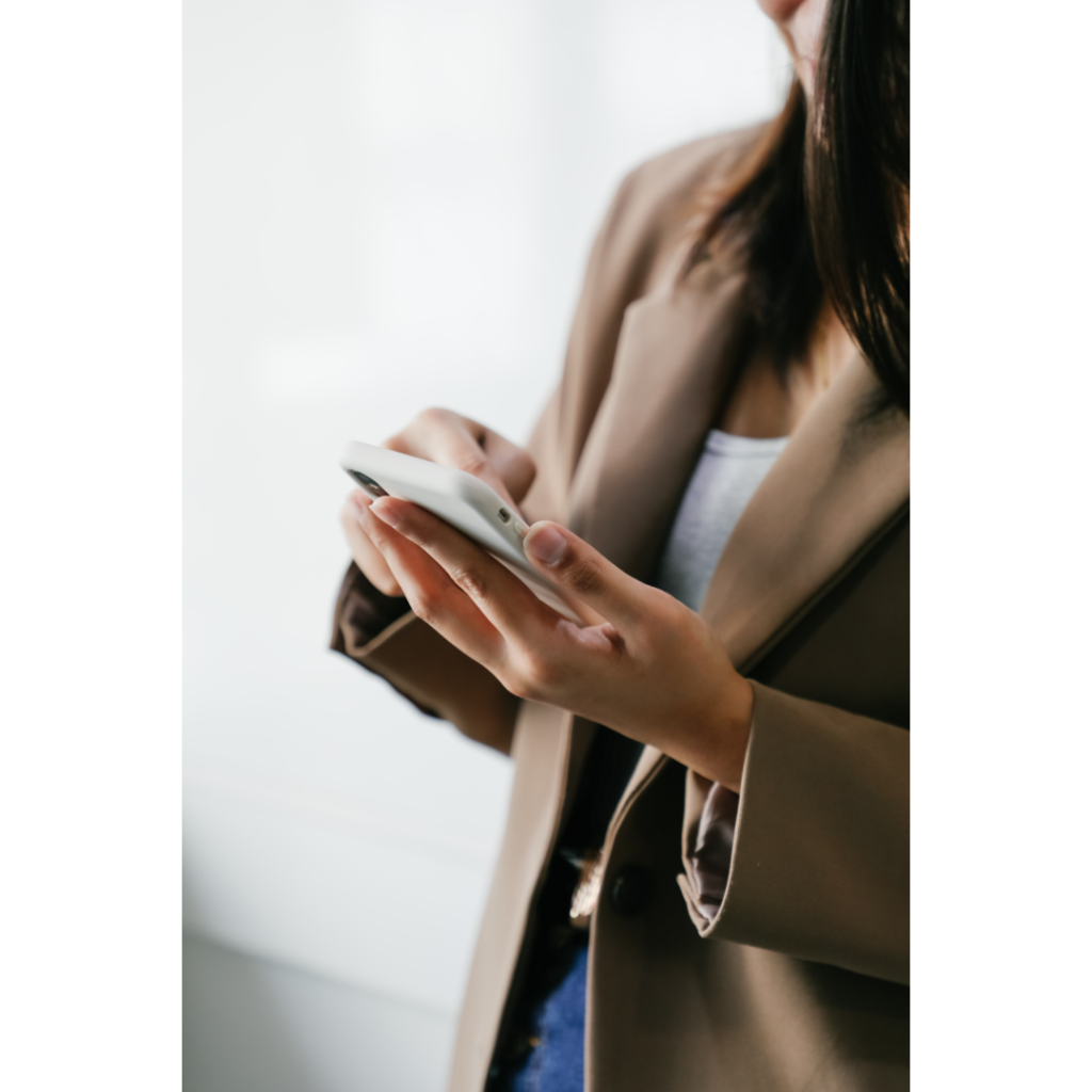 woman holding phone