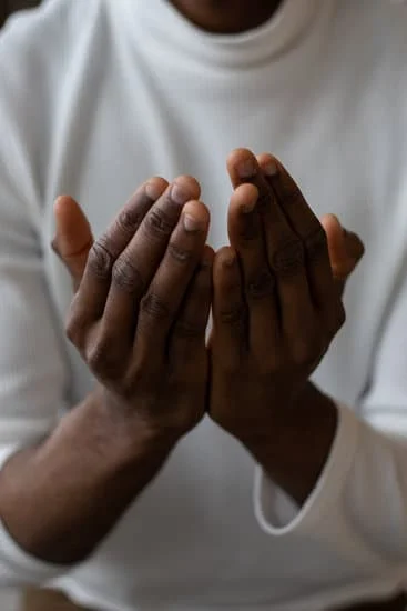Open faced hands in sign of prayer