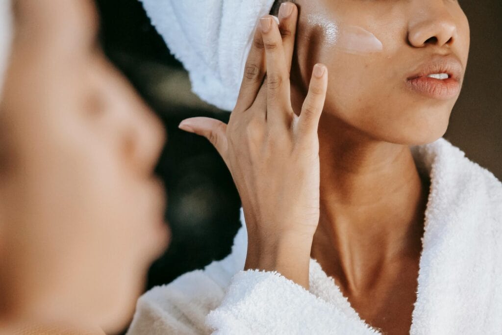 Women Applying Facial Cream