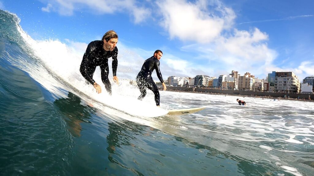 Two surfers taking the same wave (priority rule) (Canary Islands)