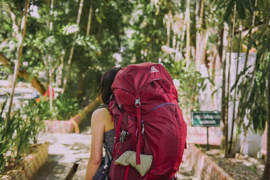Solo female traveler with backpack
