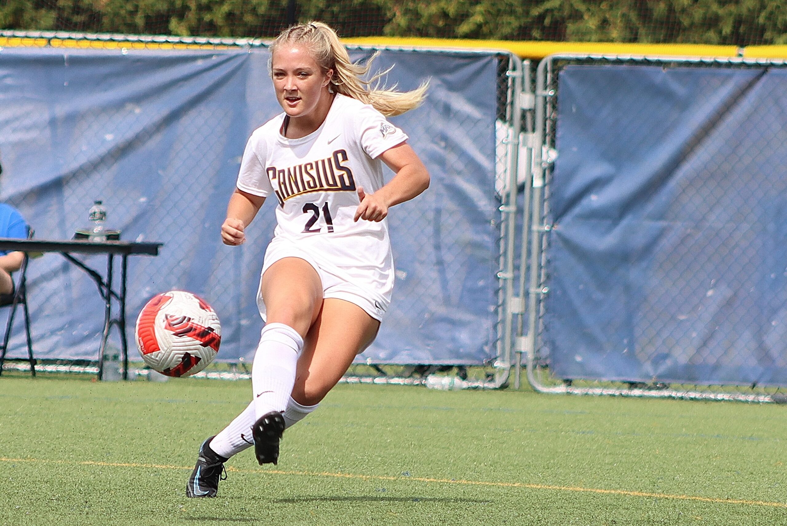 Emily Brewer Kicking Soccer Ball