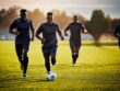 Firefly editorial style photo of soccer players running on the field 43578