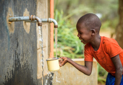 Cheru, 6, fills her cup with clean drinking water at the water kiosk near her home.

She and her whole community benefits from a 16 km gravity-fed World Vision pipeline that brings clean water to 6 kiosks in her village. Along with other children, she used to walk 6 km daily to carry water to school and home. Now the pipeline brings water to both places. 

West Pokot, KenyaSee Cheru’s story, here: https://www.worldvision.org/clean-water-news-stories/compare-walk-for-water-cheru-kamama 

Kesot community, Sook ADP, West Pokot, Kenya