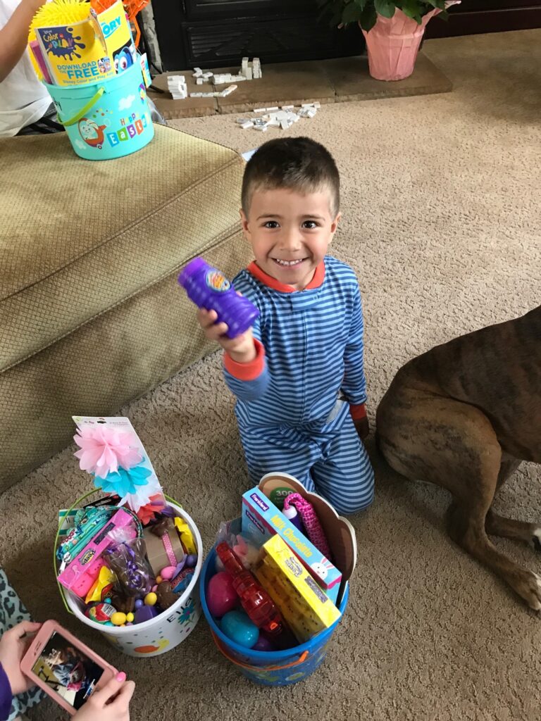child receiving easter basket