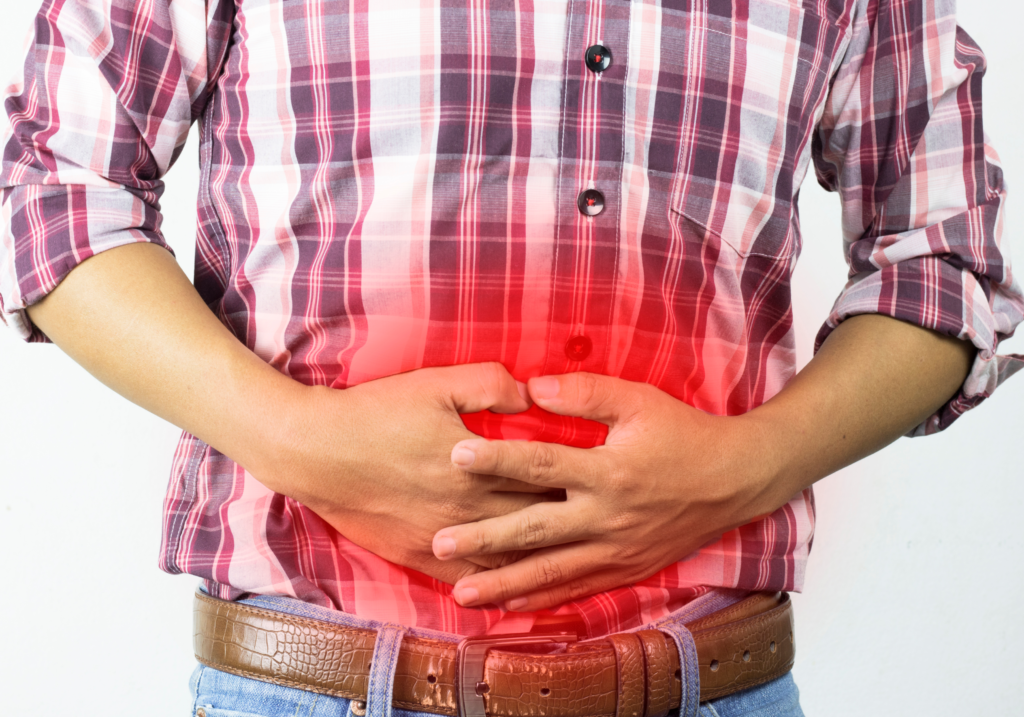 man showing stomach discomfort